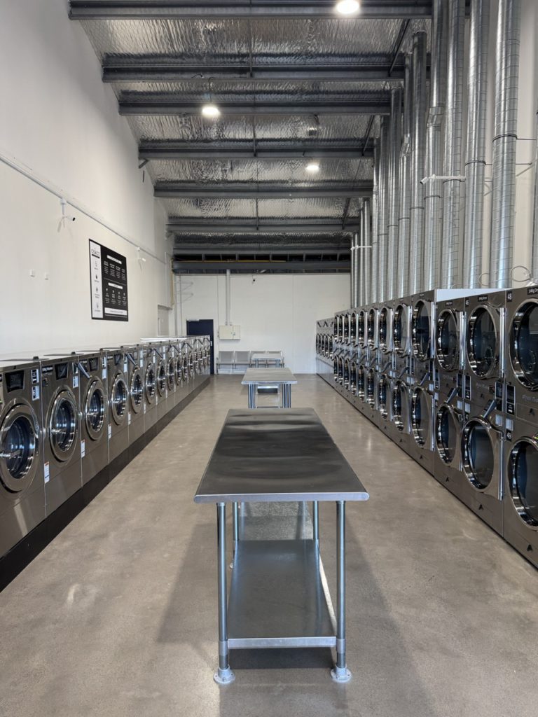 Interior of Choice Laundromats Chartwell in Hamilton showing commercial washers and dryers